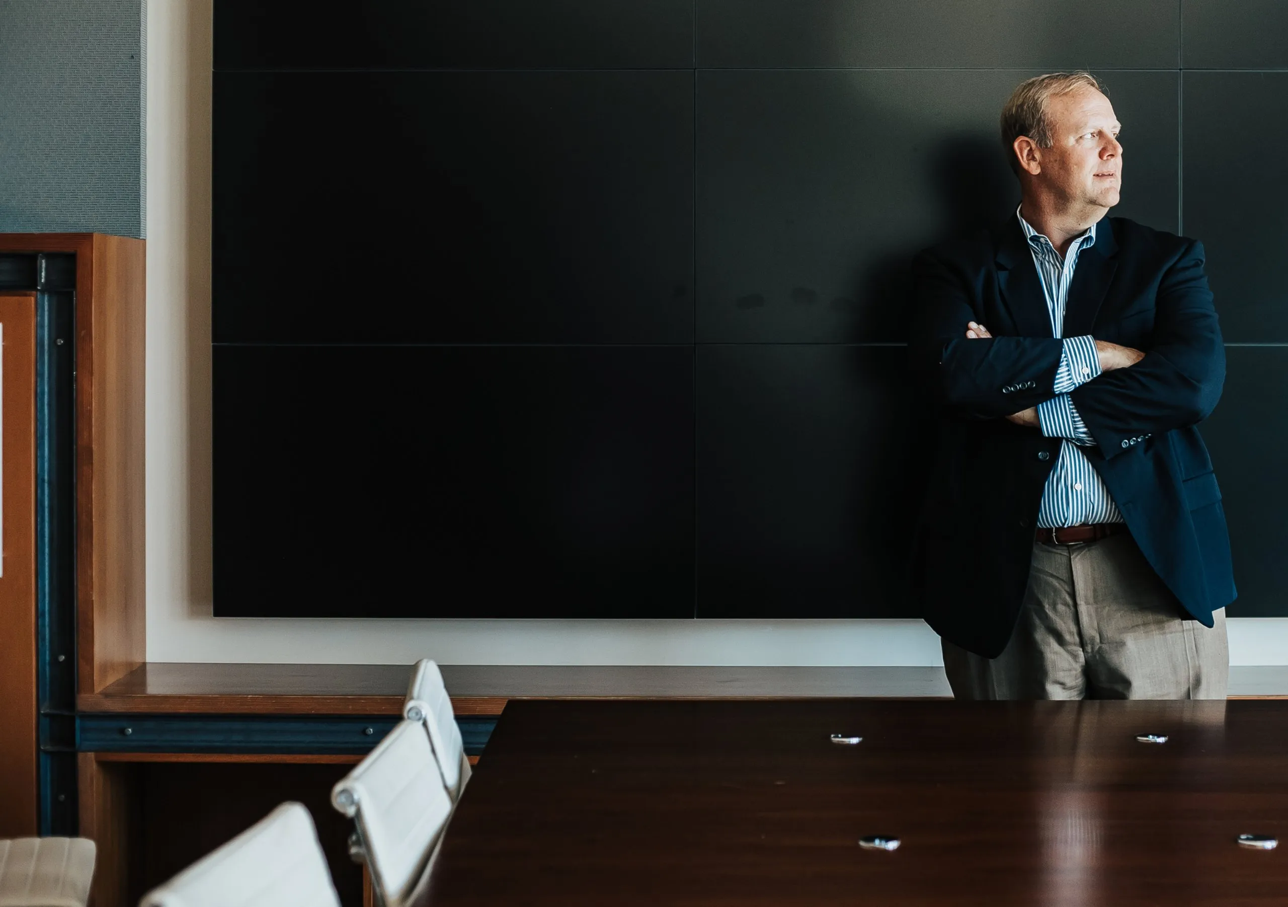 Wade Borth standing in a conference room