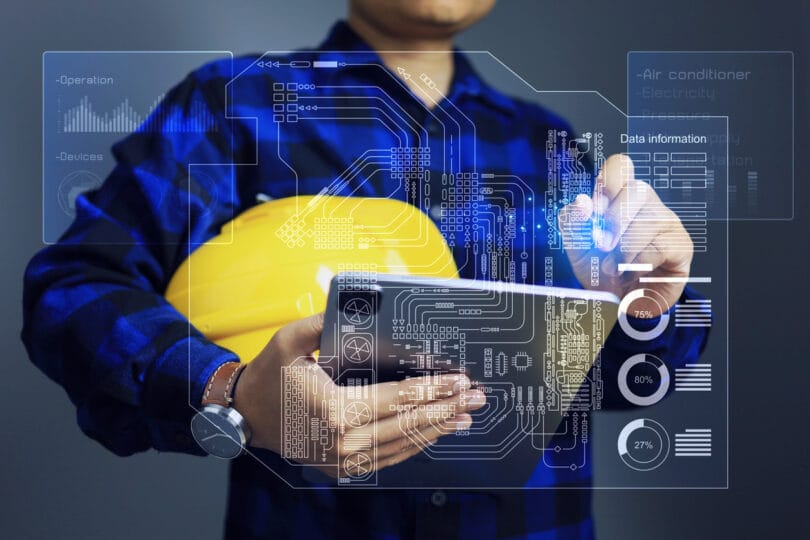 Facility management concept with engineer using tablet to monitoring single line diagram of building or factory to manage devices operation records data and scheduling for maintenance plan